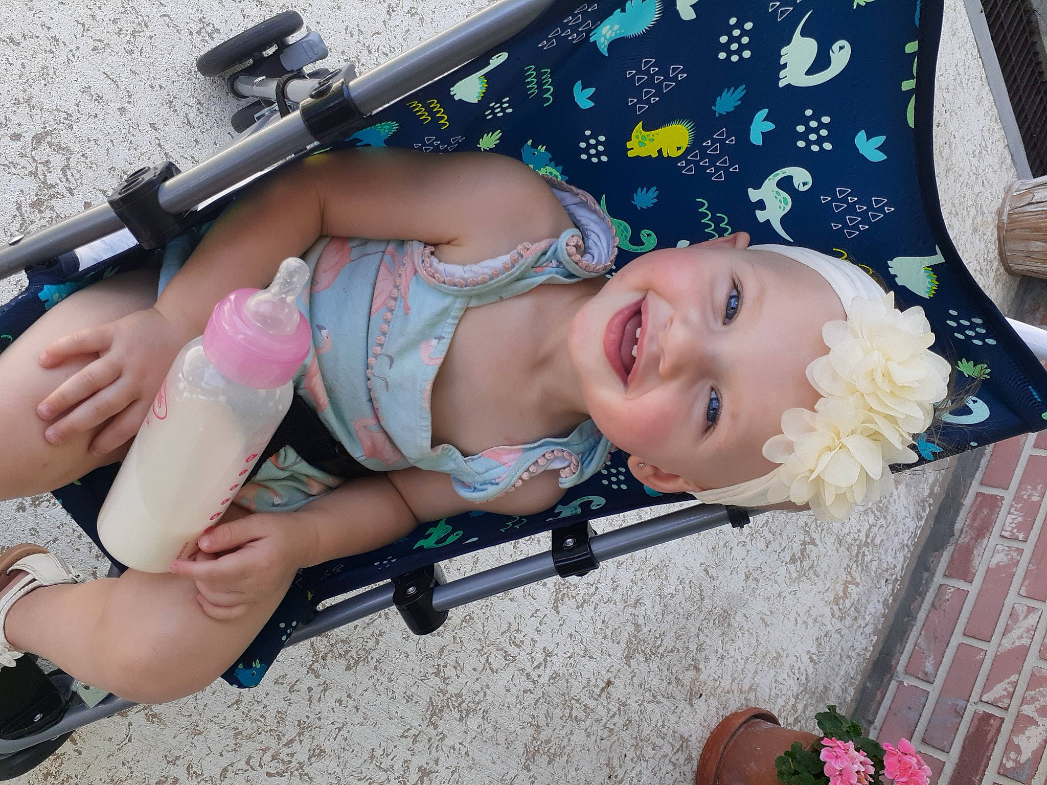 Infinity is registered to the contest to win money with this photo: baby, baby_products, baby_toddler_clothing, child, electric_blue, face, fashion_accessory, fun, happy, headwear, human_leg, joy, knee, leisure, pattern, person, pink, recreation, shorts, skin