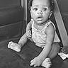 Privilege joined the competition — help win amazing prizes! baby, black_and_white, car_seat, child, curly_hair, cute, earrings, foot, hand, indoors, infant, looking_up, monochrome, portrait, seatbelt, sitting, small_person, surprised_expression, vehicle_interior, young_child