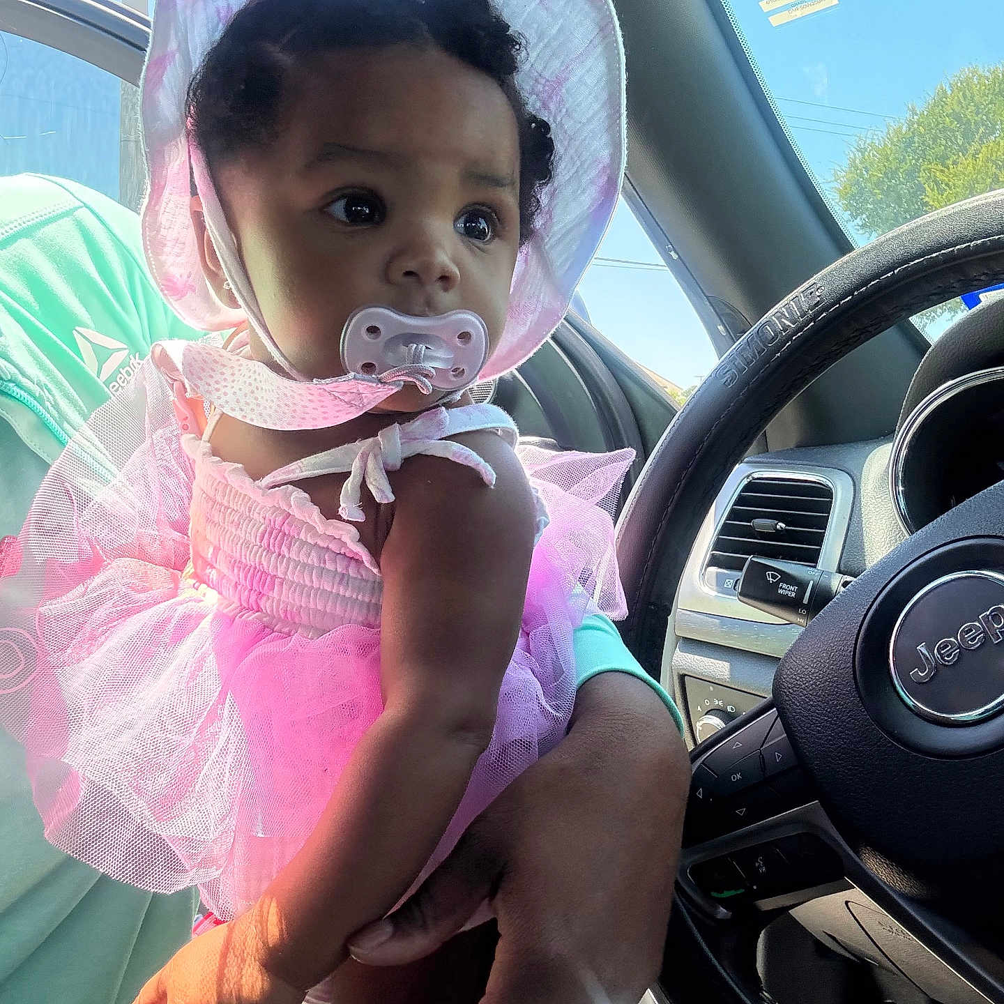 Privilege joined the competition — help win amazing prizes! arm, baby, car, child, clothing, cute, daylight, hand, hat, infant, jeep, pacifier, person, pink, portrait, seat, steering_wheel, sunlight, tutu, window