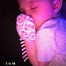 baby, sleeping, mittens, purple_light, closeup, face, infant, child, retro, timestamp, text_overlay, soft_light, peaceful, portrait, night, clothing, hand, cute, sleep, indoors