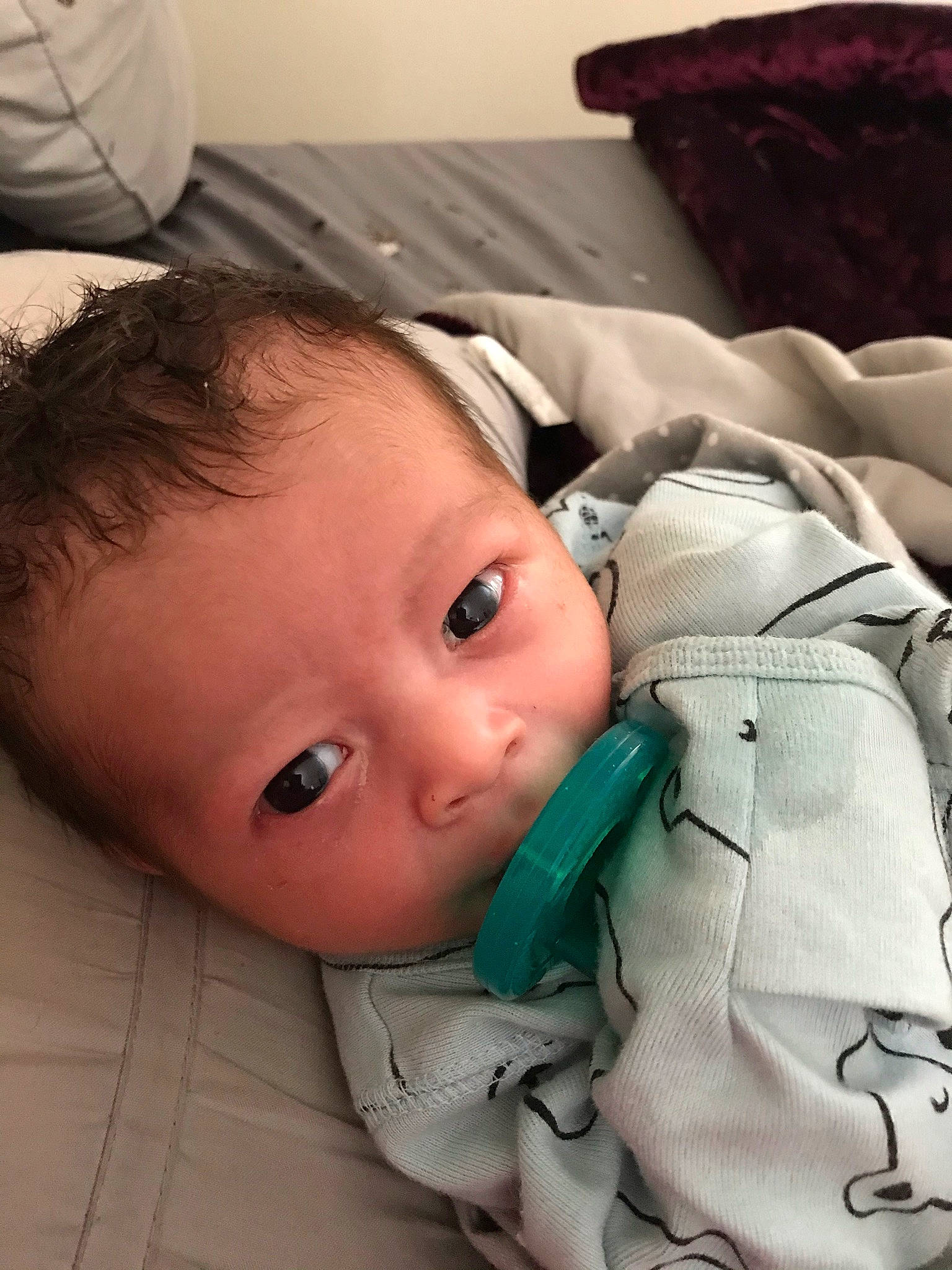 Avery is registered to the contest to win money with this photo: baby, baby_products, baby_toddler_clothing, cheek, child, comfort, eyebrow, eyelash, face, head, linens, lip, nose, pattern, person, sitting, skin, sleeve, toddler, wood