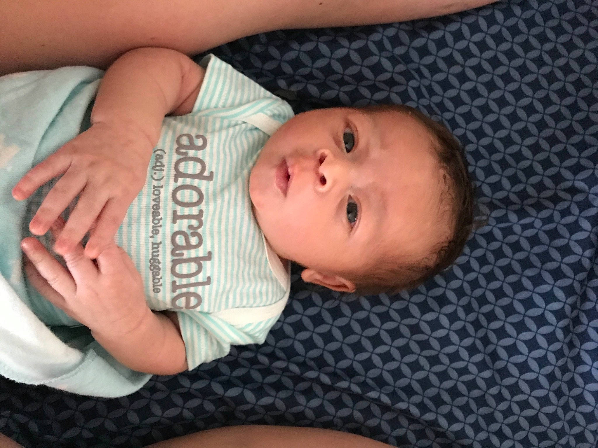 Avery is registered to the contest to win money with this photo: abdomen, baby, baby_products, baby_toddler_clothing, cheek, chest, comfort, elbow, eyelash, finger, gesture, hand, headgear, mouth, nail, person, skin, sleeve, stomach, toddler