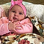 Valeria is registered to the contest to win money with this photo: adorable, baby, big_eyes, blanket, bow, cheeks, child, cozy, face, floral_blanket, hands, head, indoor, infant, pink_clothing, pink_headband, plush, portrait, smile, tiled_floor