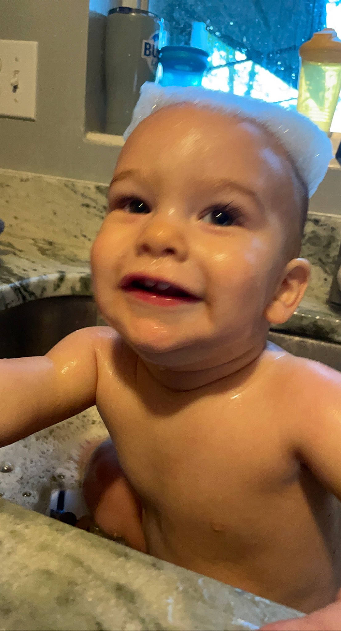 Waylon is registered to the contest to win money with this photo: baby_bathing, blue, cheek, chest, eyebrow, eyelash, facial_expression, finger, forehead, happy, human_body, iris, jaw, joy, lip, mouth, muscle, nose, person, skin