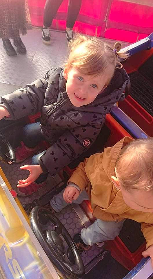 Chloé participe au concours pour gagner de l'argent avec cette photo : baby_products, bag, child, flooring, fun, joy, lap, leisure, luggage_and_bags, motor_vehicle, person, photograph, recreation, red, shoe, sitting, skin, snapshot, sneakers, toddler