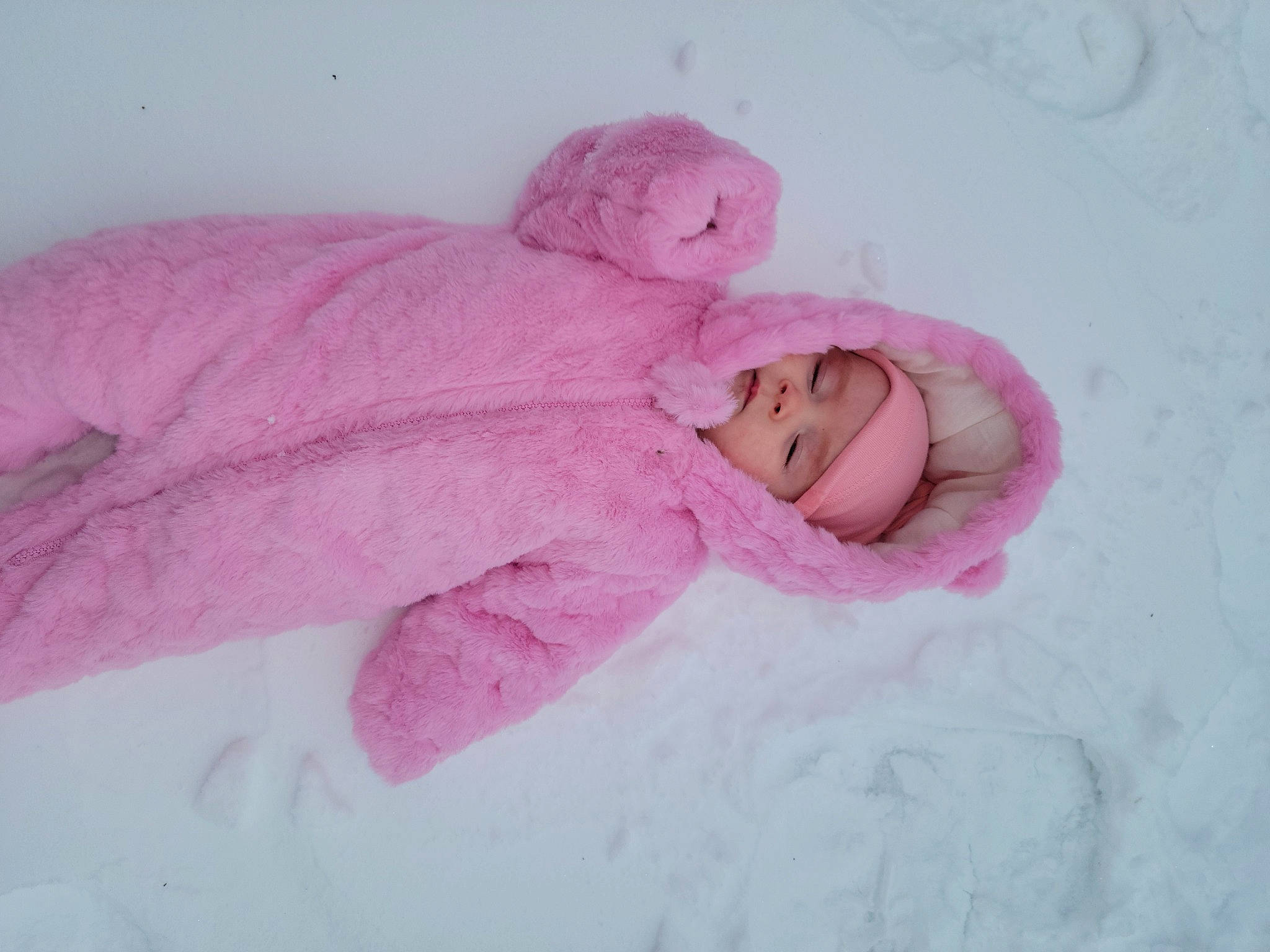 Annie joined the competition — help win amazing prizes! baby, baby_products, baby_sleeping, baby_toddler_clothing, beanie, cheek, child, comfort, fur, hair_accessory, headgear, headwear, knit_cap, linens, magenta, person, petal, pink, room, textile