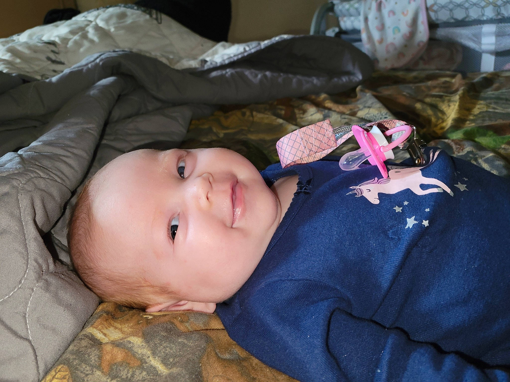 Emberly joined the competition — help win amazing prizes! baby, baby_toddler_clothing, cheek, child, comfort, fur, grass, hat, person, portrait_photography, sitting, sleep, sleeve, smile, textile, toddler, tree, wood