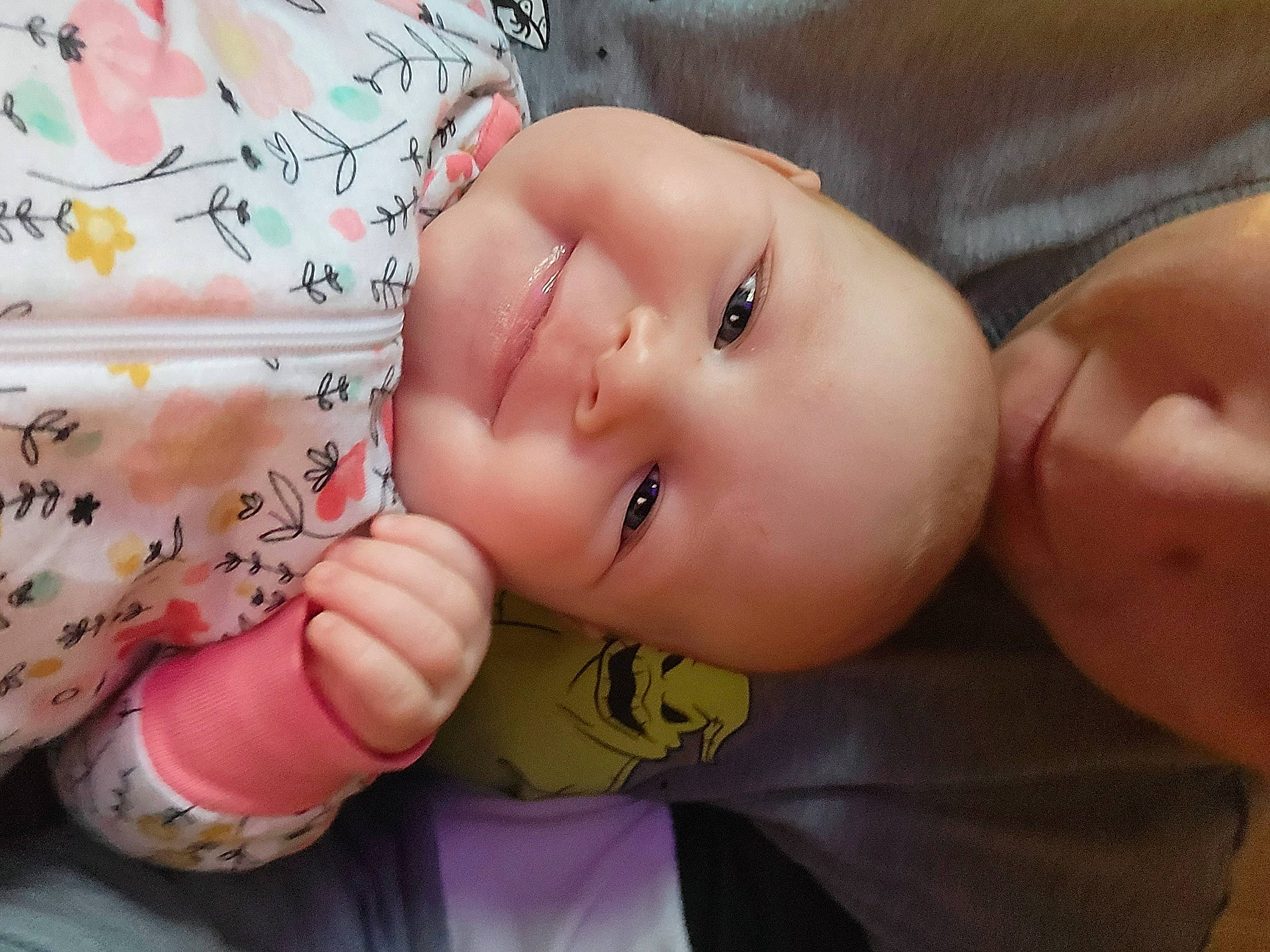 Emberly is registered to the contest to win money with this photo: arm, baby, baby_toddler_clothing, cheek, chin, eye, eyebrow, eyelash, face, finger, gesture, hand, head, human_body, iris, joy, lip, mouth, nose, person
