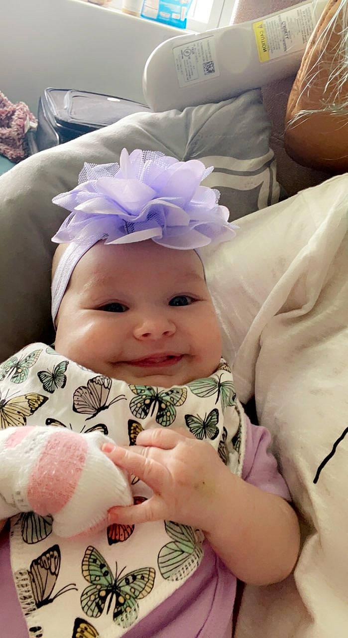 Novalee joined the competition — help win amazing prizes! baby, baby_toddler_clothing, cheek, comfort, eye, eyebrow, flower, glasses, happy, head, headband, headgear, headwear, iris, lip, person, petal, pink, purple, skin