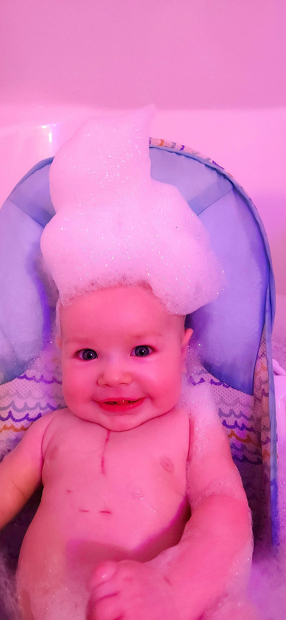 Novalee is registered to the contest to win money with this photo: baby, baby_toddler_clothing, cap, child, costume_hat, eyebrow, fictional_character, fun, happy, headpiece, joy, magenta, nose, party_hat, party_supply, person, pink, purple, skin, smile