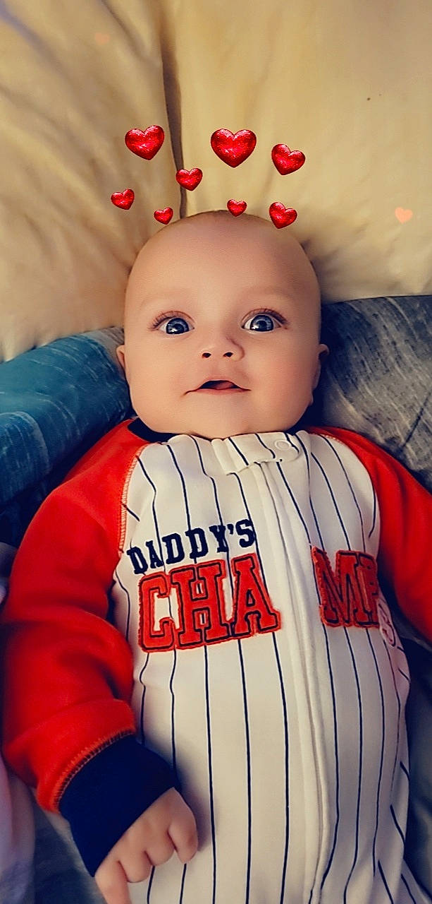 Larson joined the competition — help win amazing prizes! baby, baby_sleeping, baby_toddler_clothing, cheek, chin, eye, eyebrow, forehead, happy, head, human_body, jersey, lip, mouth, nose, organ, person, sleeve, smile, textile