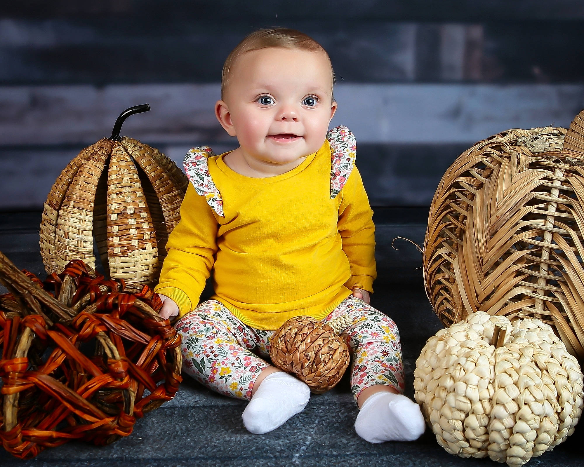 Kiera is registered to the contest to win money with this photo: baby, baby_toddler_clothing, basket, child, fun, grass, happy, head, headgear, joy, natural_foods, person, plant, product, sitting, smile, storage_basket, toddler, vegetable, wicker
