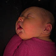 Willow joined the competition — help win amazing prizes! baby, newborn, sleeping, infant, onesie, pink_clothing, close_up, portrait, cheek, peaceful, parent_chest, cuddle, indoor, dim_light, soft_skin, ear, nose, mouth, bedtime, family