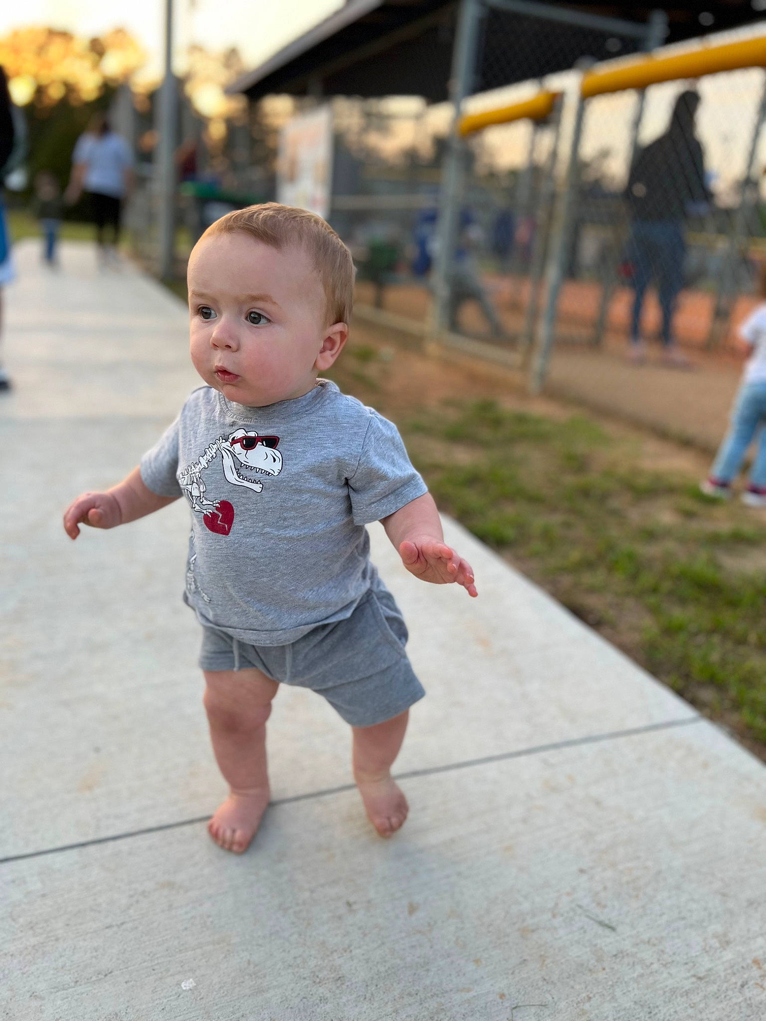 Axel joined the competition — help win amazing prizes! baby, barefoot, chin, daytime, fun, grass, hairstyle, happy, human, leisure, mammal, morning, person, public_space, recreation, shorts, skin, sleeve, summer, toddler