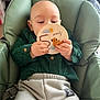 Kenzo participe au concours pour gagner de l'argent avec cette photo : baby, child, infant, milestone_card, green_chair, clothing, shirt, pants, hand, face, sitting, indoor, milestone, cute, portrait, holding, comfort, childhood, cartoon, soft_focus