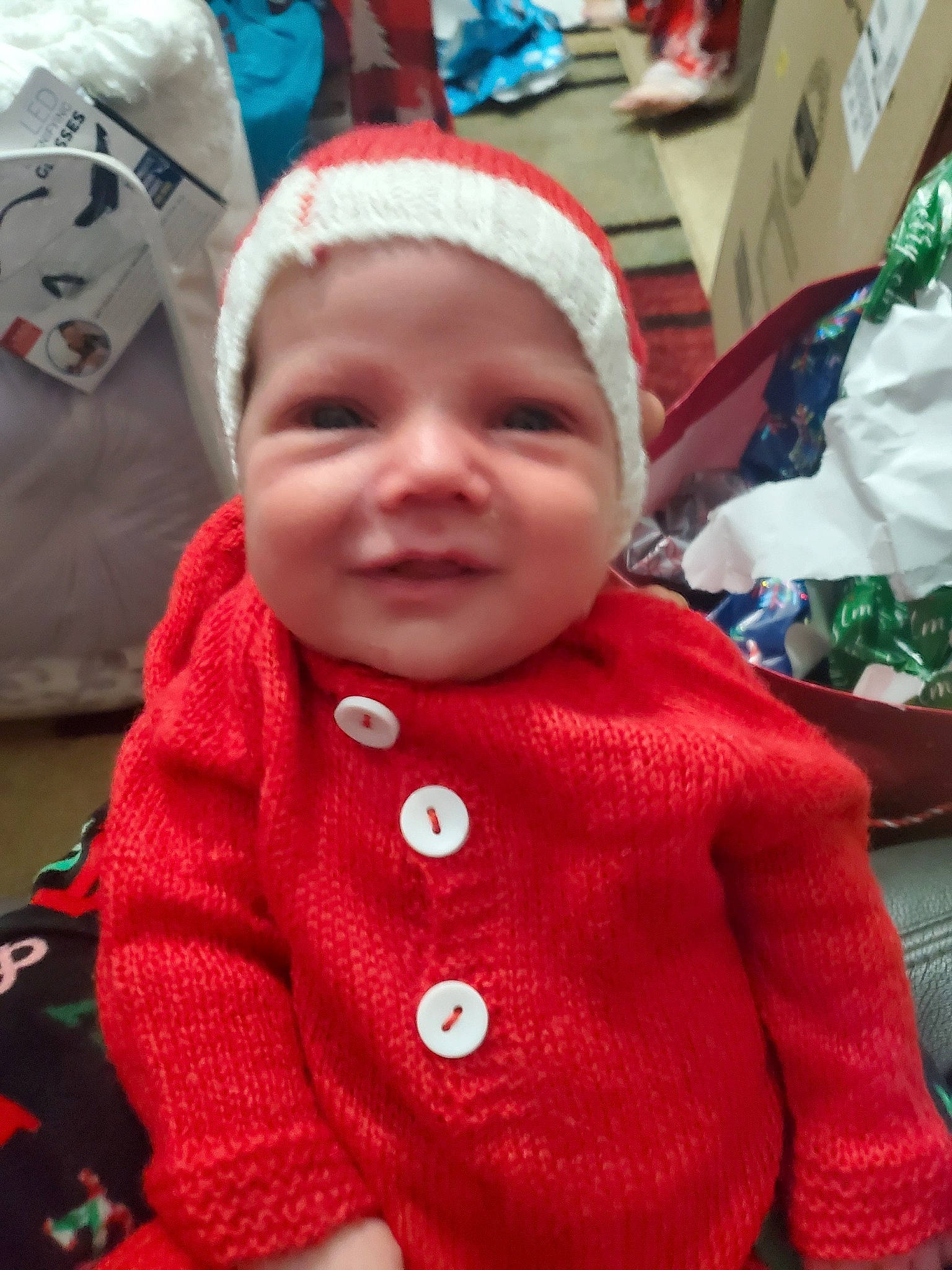 Connor is registered to the contest to win money with this photo: baby, baby_toddler_clothing, cap, cheek, child, event, fun, happy, headwear, holiday, knit_cap, leisure, person, pink, skin, sleeve, smile, textile, toddler, winter