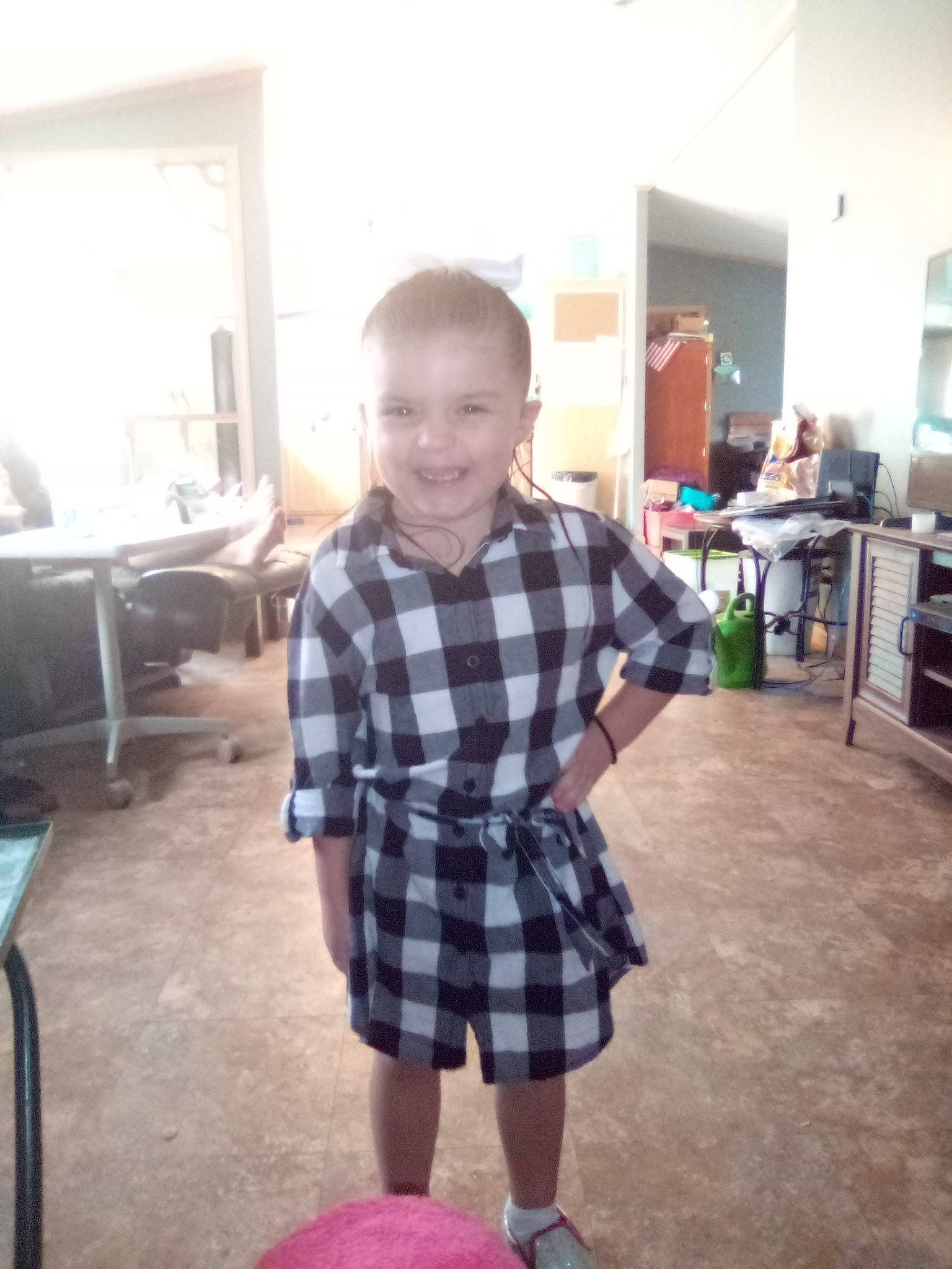 Makinzie is registered to the contest to win money with this photo: cabinetry, calf, countertop, cupboard, drawer, floor, flooring, home, human_leg, joy, kitchen, kitchen_appliance, kitchen_stove, major_appliance, pattern, person, plaid, room, shirt, shoe