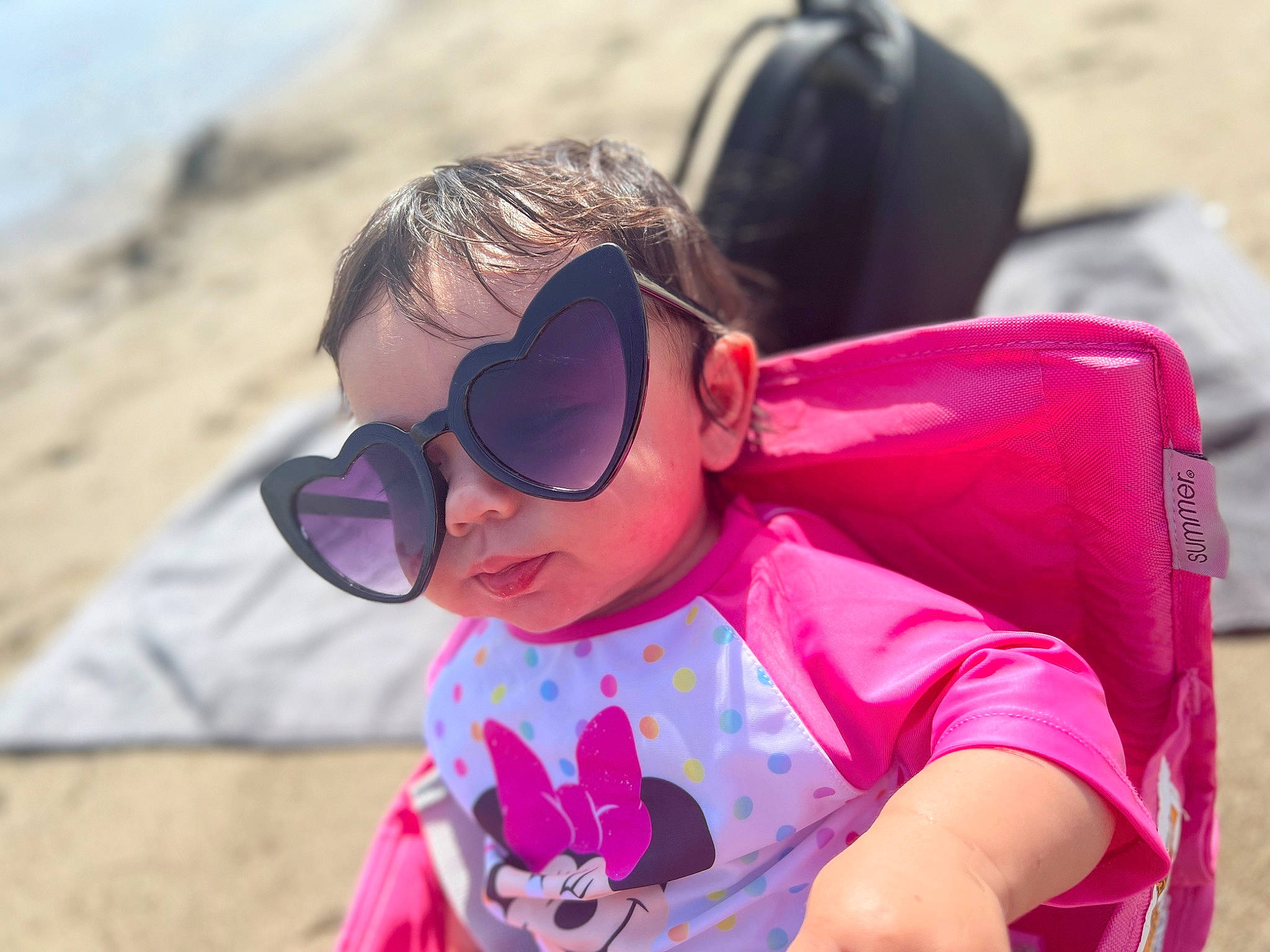 Lilianna joined the competition — help win amazing prizes! baby_toddler_clothing, beach, child, cool, eyewear, face, fun, goggles, grass, happy, landscape, leisure, magenta, person, personal_protective_equipment, pink, recreation, sunglasses, toddler, travel