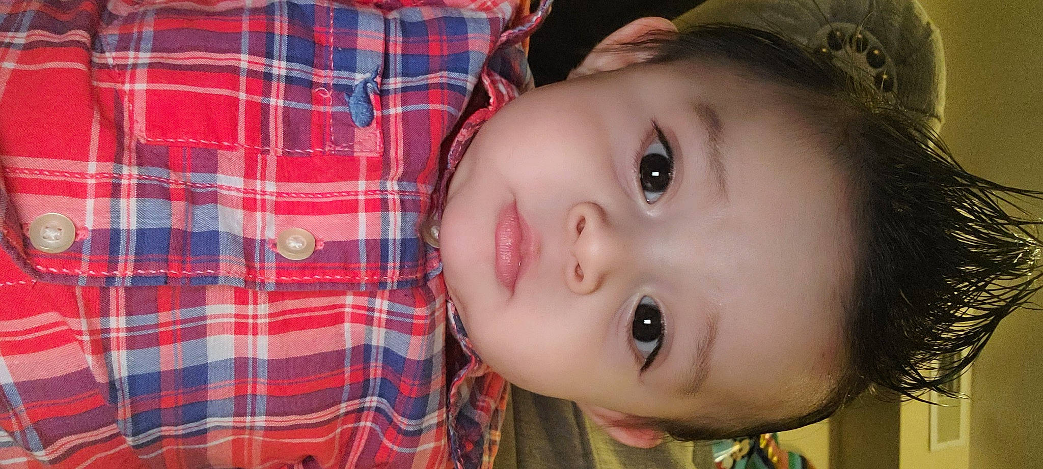 Dominik is registered to the contest to win money with this photo: baby, cheek, cool, eye, eyebrow, eyelash, face, flash_photography, forehead, hat, head, iris, lip, mouth, nose, pattern, person, plaid, skin, tartan