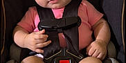 Xiomara joined the competition — help win amazing prizes! baby, black_background, car_seat, child, closeup, cute, feet, flower, hands, headband, heart_doodle, human, indoors, infant, legs, pink_shirt, portrait, safety, seat, straps