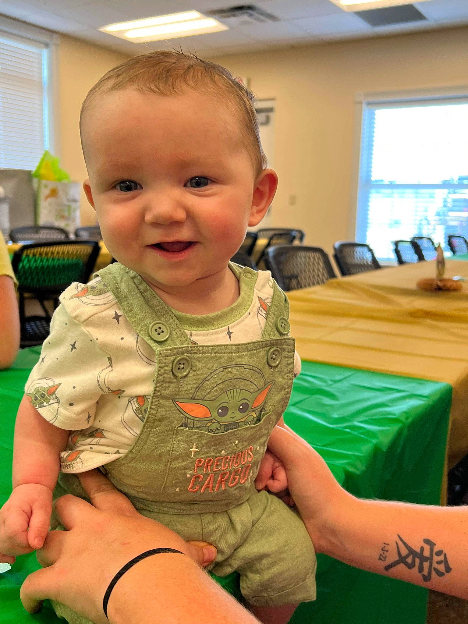 Hudson joined the competition — help win amazing prizes! baby, baby_toddler_clothing, chair, cheek, child, event, finger, flooring, fun, grass, green, human_leg, joy, leisure, person, room, sitting, skin, smile, thigh