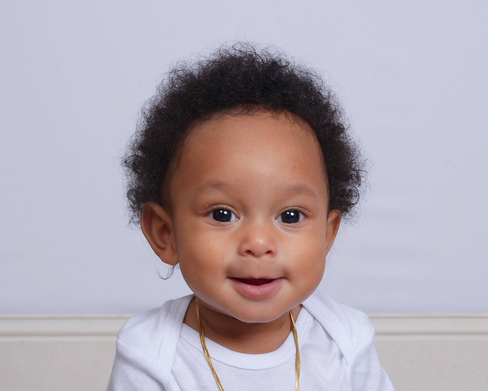 Ace is registered to the contest to win money with this photo: baby, baby_toddler_clothing, cheek, child, ear, eyebrow, eyelash, flash_photography, fun, gesture, happy, iris, lip, neck, no_expression, nose, person, portrait_photography, sleeve, smile