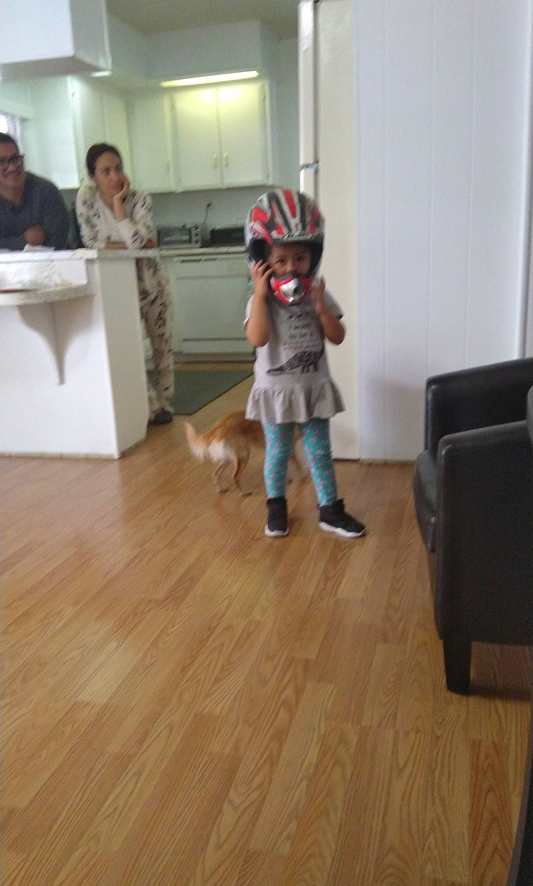 Jayleen is registered to the contest to win money with this photo: child, floor, flooring, fun, hardwood, headwear, laminate_flooring, leg, person, play, room, standing, toddler, wood, wood_flooring