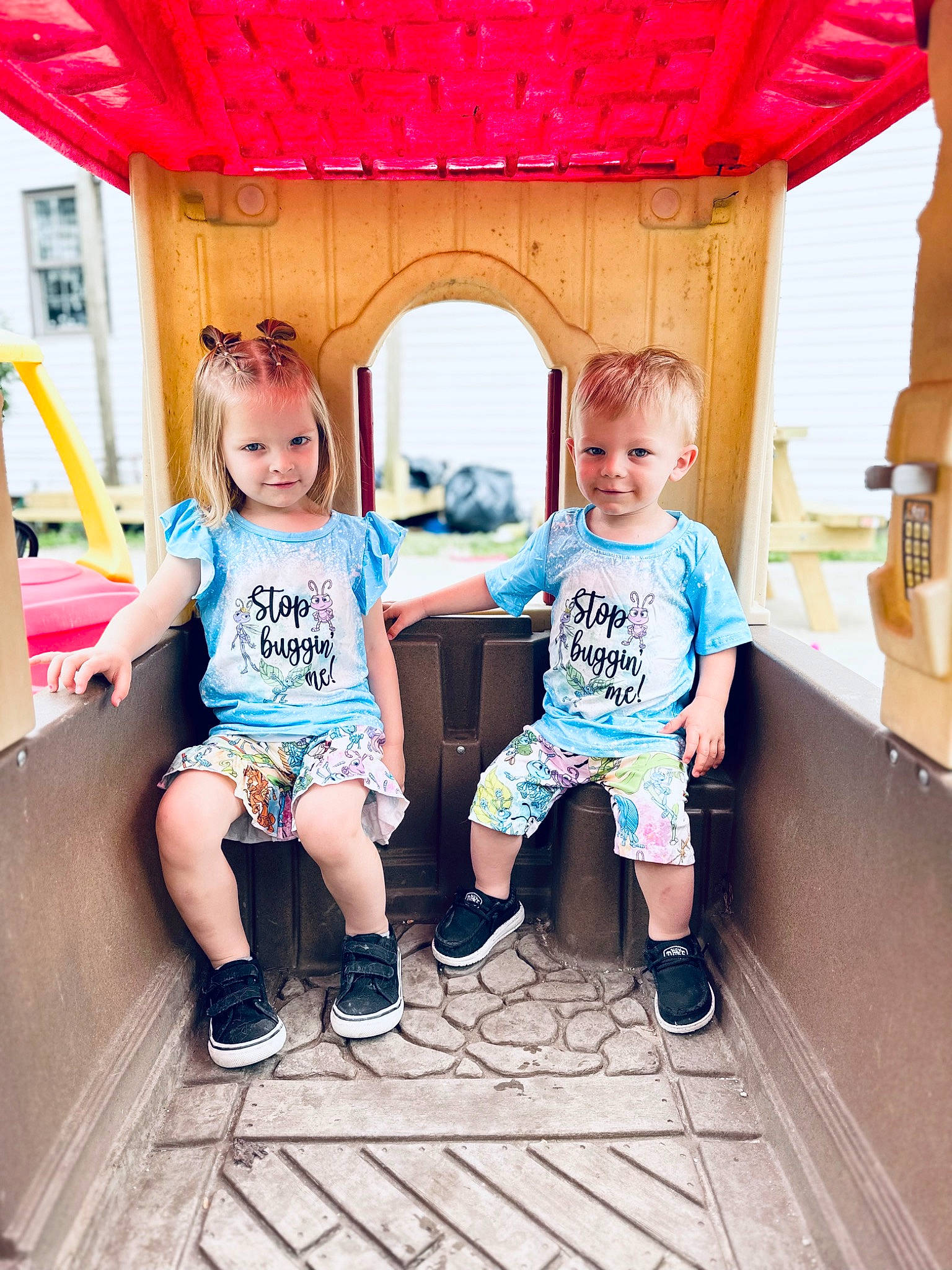 Roselynn is registered to the contest to win money with this photo: child, city, event, facial_expression, fun, happy, joy, leisure, magenta, person, pink, play, public_space, recreation, room, sandal, shorts, sitting, sneakers, t_shirt