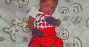 Kareem joined the competition — help win amazing prizes! baby, bed, blanket, child, closed_eyes, cute, face, heart_emojis, indoors, infant, lying_down, mittens, onesie, peaceful, portrait, red_clothing, sleeping, socks, teddy_bears, white_clothing