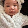 Nova Rios is registered to the contest to win money with this photo: adorable, baby, blanket, child, closeup, cozy, cute, expression, eyes, face, fur, hood, infant, newborn, portrait, skin, sleepwear, soft, warm, white