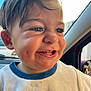 toddler, child, smiling, face, teeth, hair, blue_eyes, white_shirt, car_interior, window, sunlight, happy, cute, closeup, person, young_child, dimple, clothing, seat, indoors