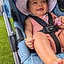Naomi joined the competition — help win amazing prizes! baby, child, stroller, hat, smile, outdoor, grass, pacifier, clothing, seatbelt, happy, cute, infant, person, portrait, sunhat, babywear, babygear, babyaccessory, summer