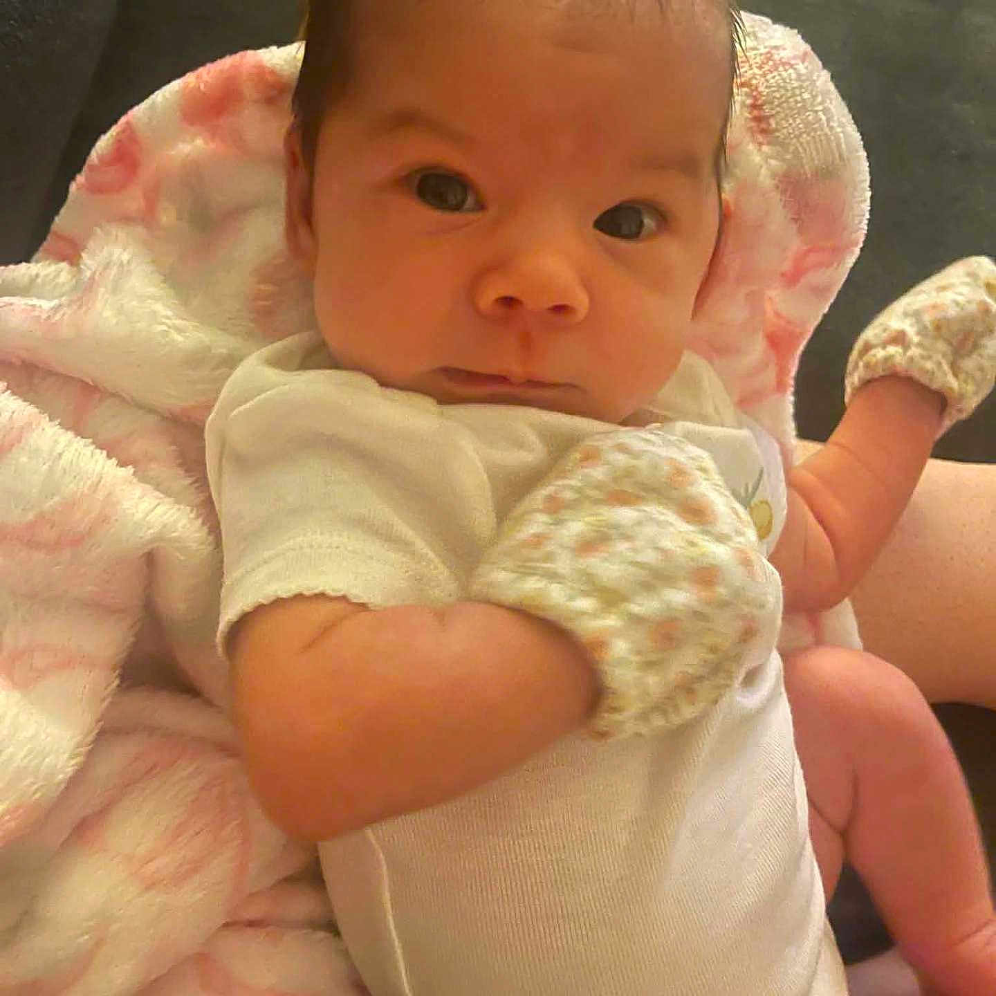 Dena Marie joined the competition — help win amazing prizes! baby, infant, onesie, mittens, blanket, pink, white, soft, cute, newborn, face, arms, legs, skin, person, indoor, candid, portrait, child, cozy