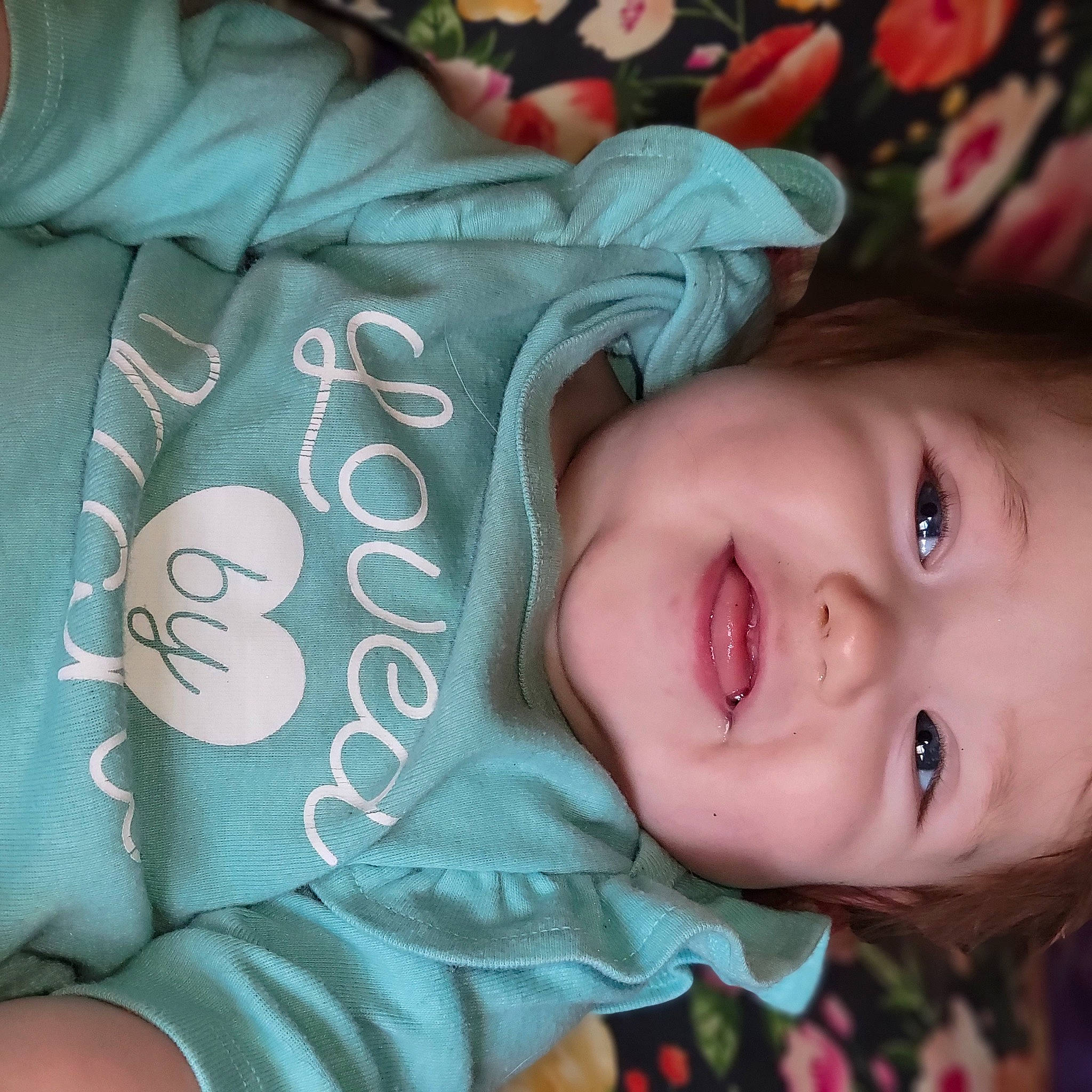 Alyvia is registered to the contest to win money with this photo: baby, baby_toddler_clothing, cheek, chin, comfort, eyebrow, eyelash, happy, head, lip, mammal, mouth, nose, person, product, skin, sleeve, smile, toddler, tree