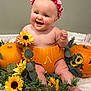 baby, flower_crown, pumpkin, sunflower, greenery, smiling, cute, sitting, indoor, child, autumn, decorative, happy, skin, headwear, nature, cute_baby, holiday, portrait, playful
