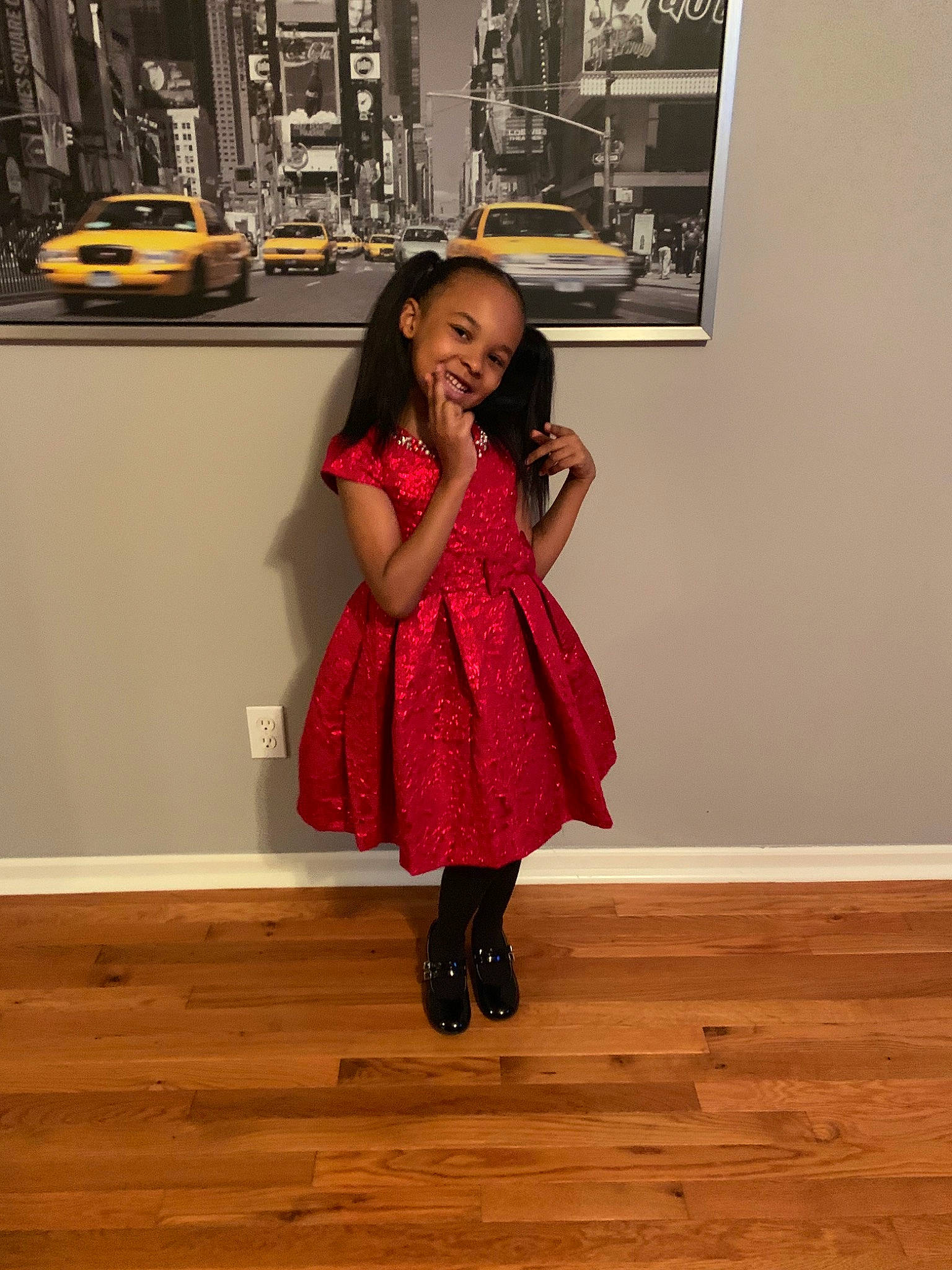 Megan is registered to the contest to win money with this photo: abdomen, child, child_model, dress, fashion_design, fawn, floor, flooring, footwear, hardwood, joint, joy, leg, magenta, person, photography, pink, shoulder, toddler, trunk