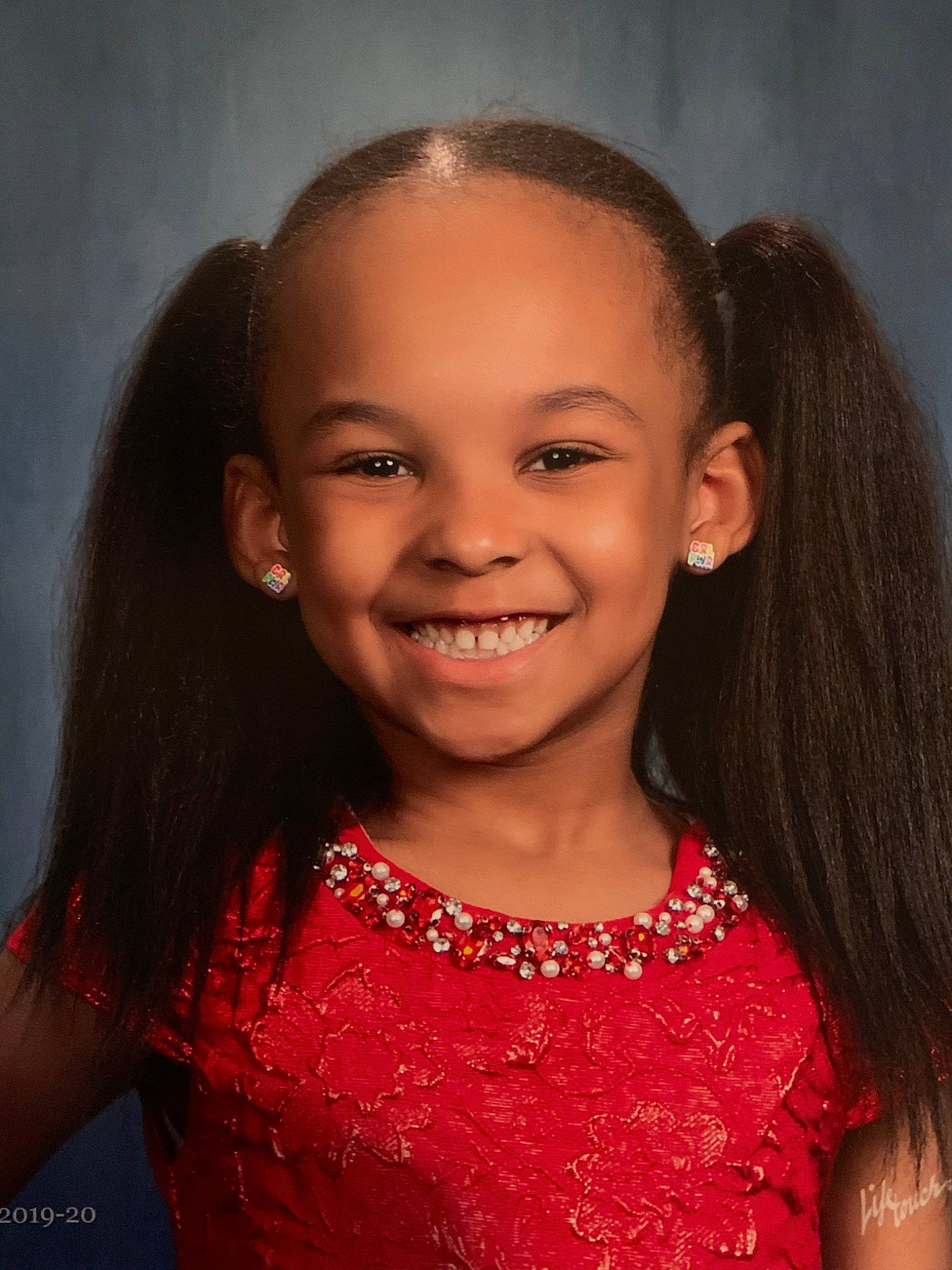 Megan is registered to the contest to win money with this photo: cheek, child, child_model, eyebrow, face, forehead, hair, hairstyle, happy, joy, lip, long_hair, person, smile