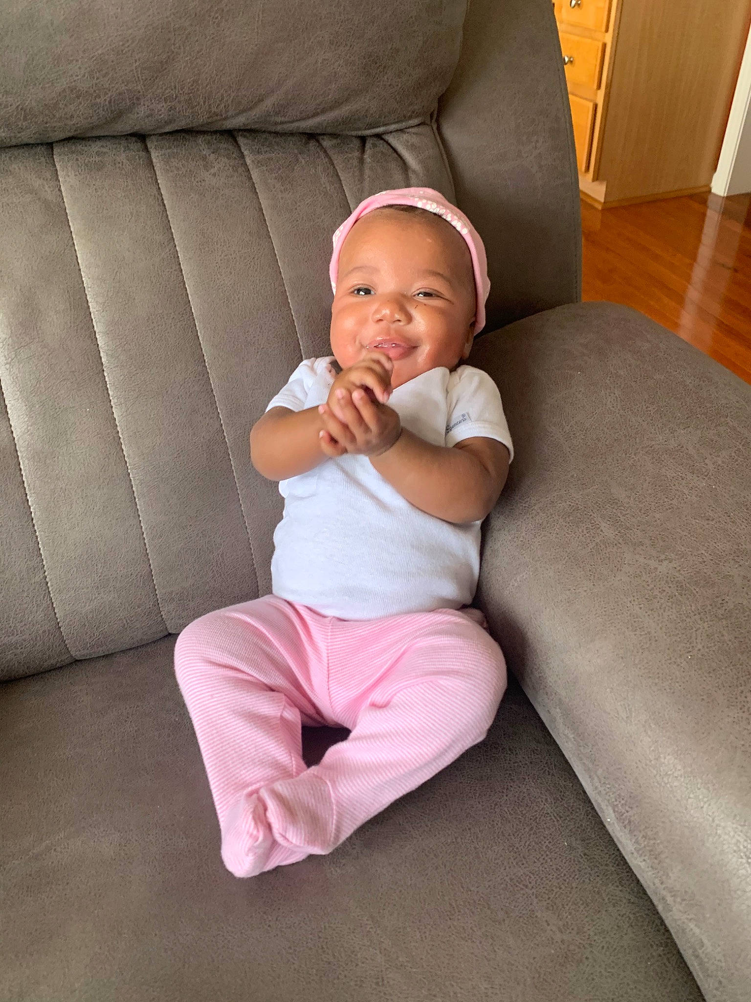 Chloe is registered to the contest to win money with this photo: baby, child, comfort, furniture, leg, person, sitting, toddler