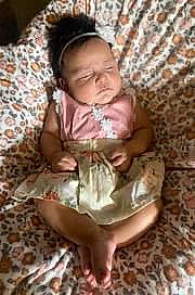 Kailani joined the competition — help win amazing prizes! baby, baby_products, baby_toddler_clothing, beard, cheek, child, comfort, face, flooring, fur, hair, happy, head, human_body, nose, person, play, room, sitting, thumb