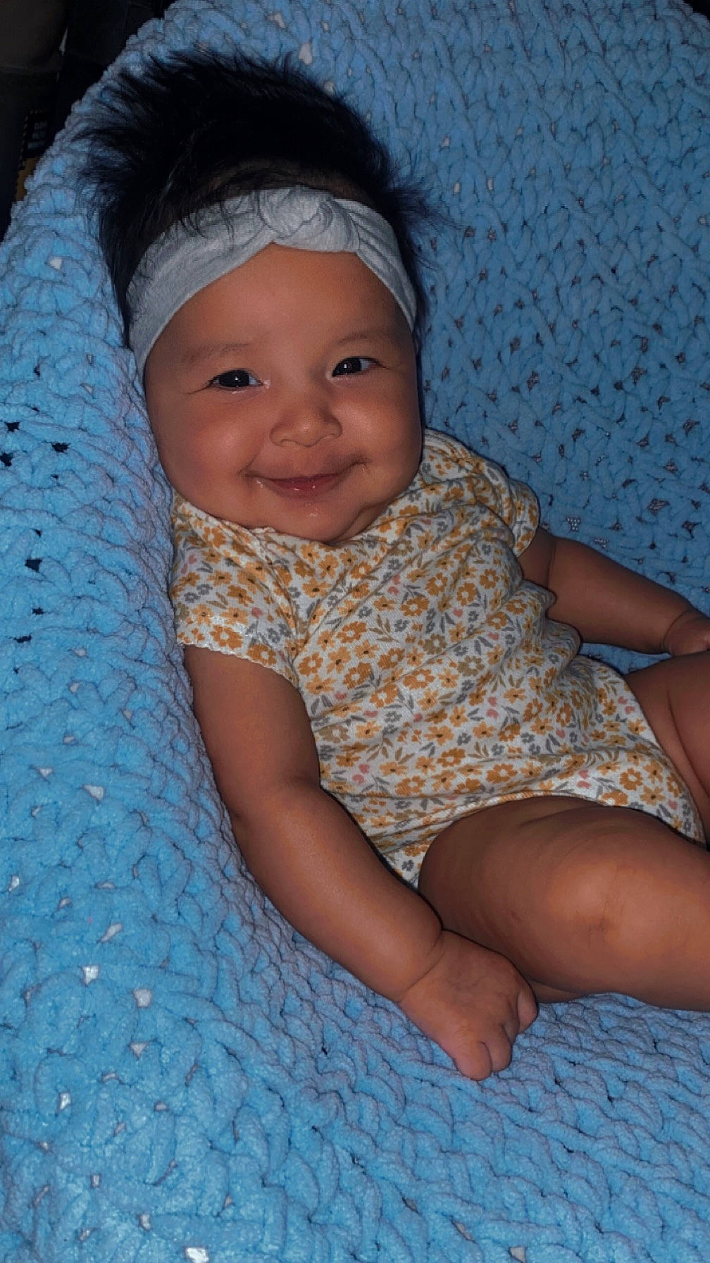 Kailani joined the competition — help win amazing prizes! baby, baby_toddler_clothing, blue, chin, comfort, eye, eyebrow, finger, happy, head, headwear, iris, joy, lip, mouth, nose, pattern, person, skin, smile