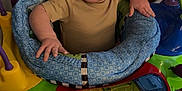 Cameron joined the competition — help win amazing prizes! baby, child, indoor, activity_jumper, toy, colorful, curious, infant, floor, playtime, expression, person, seat, clothing, face, hands, wooden_floor, home, smile, young