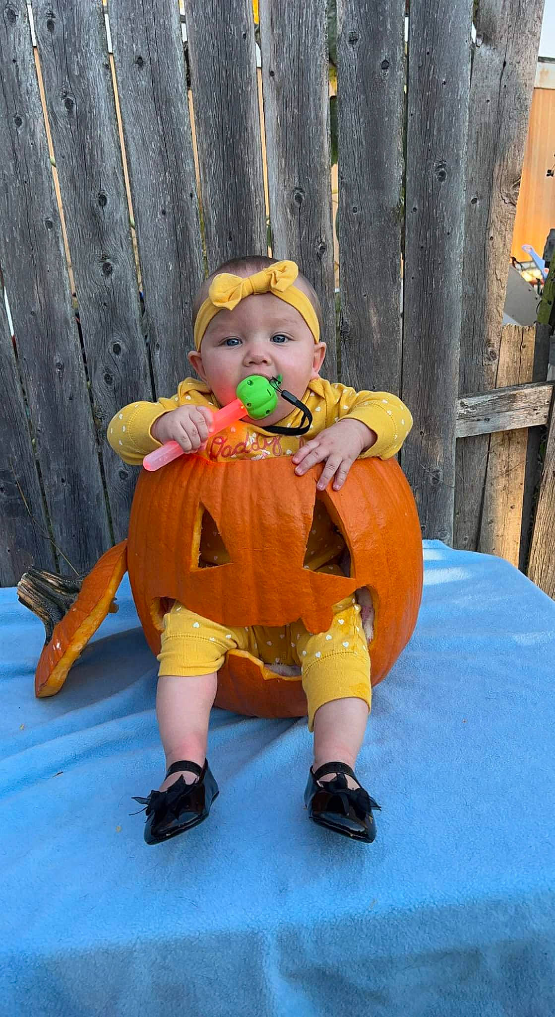 Amoura joined the competition — help win amazing prizes! baby, baby_toddler_clothing, calabaza, child, fictional_character, flooring, fun, happy, hat, headwear, lawn_ornament, leisure, orange, peach, person, pumpkin, purple, sitting, toddler, trick_or_treat
