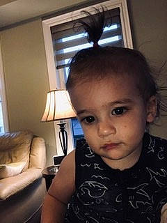 Stefan joined the competition — help win amazing prizes! baby_toddler_clothing, black_hair, cheek, child, comfort, ear, eyelash, face, forehead, fun, happy, iris, lamp, lip, nose, person, room, sitting, skin, t_shirt