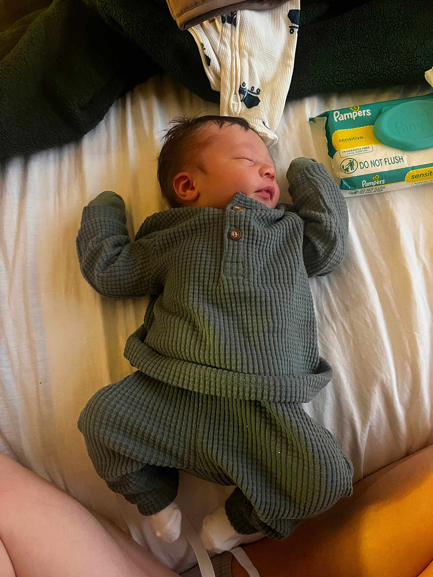 Dawson joined the competition — help win amazing prizes! newborn, baby, sleeping, infant, bed, blanket, clothing, pampers, baby_wipes, white_sheet, person, soft_lighting, cozy, cute, indoors, resting, small, newborn_clothes, peaceful, baby_sleep