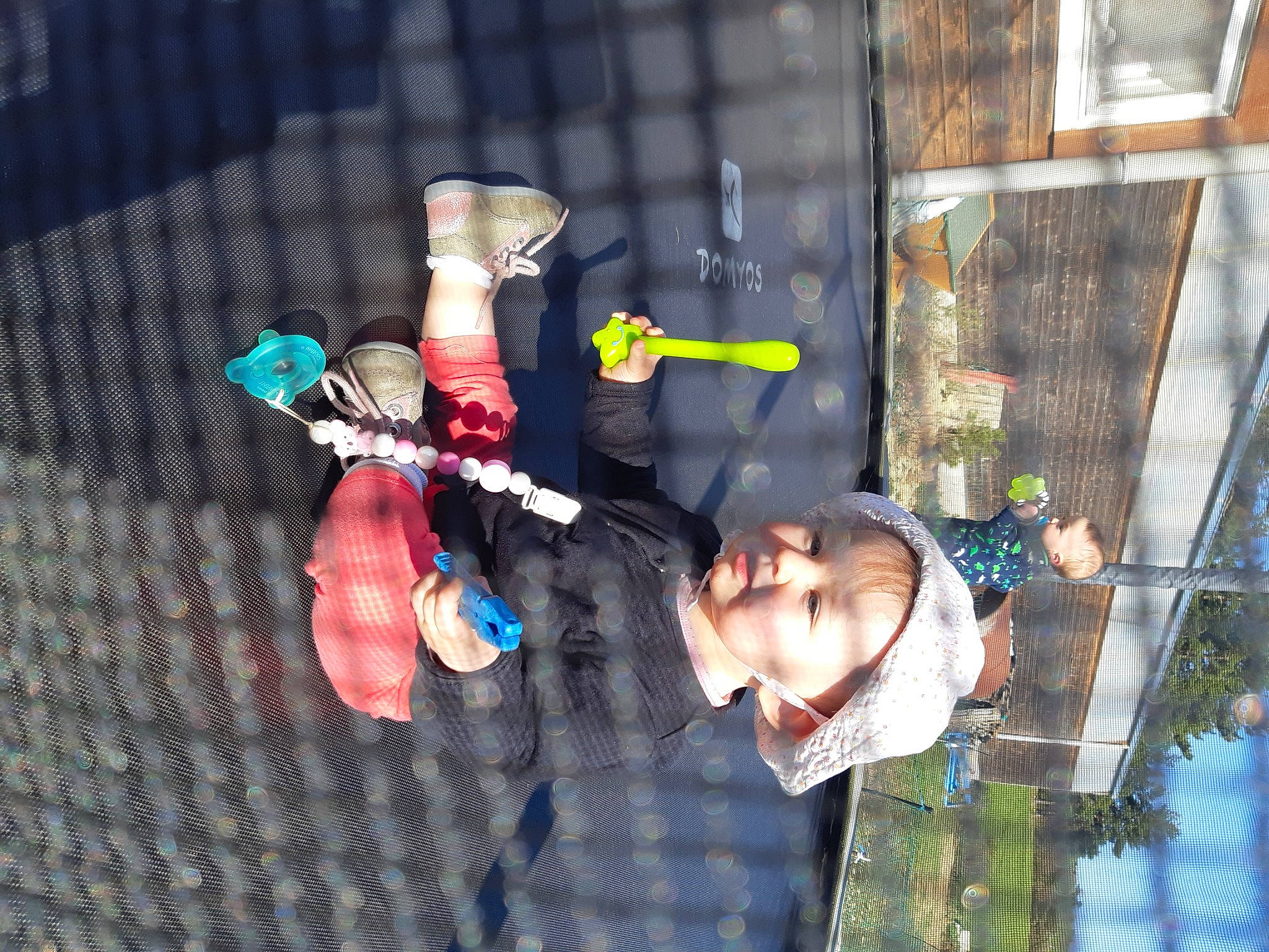 Emilie a rejoint le concours — aidez-le/la à gagner de superbes lots ! carmine, child, event, fun, gesture, hat, leisure, pattern, person, recreation, smile, toddler, tree, window