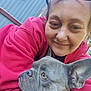 Smokey joined the competition — help win amazing prizes! person, dog, french_bulldog, pet, smile, outdoor, casual, pink_sweatshirt, face, head, ears, close_up, companion, friendship, happy, animal, portrait, daylight, metal_wall, grass