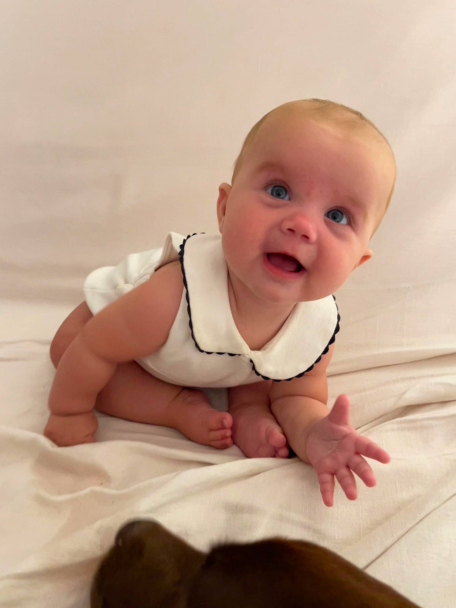 Eleanor a rejoint le concours — aidez-le/la à gagner de superbes lots ! baby, baby_toddler_clothing, cheek, chin, comfort, dress, eye, finger, flash_photography, flooring, foot, happy, iris, leg, lip, person, pink, skin, sleeve, stomach