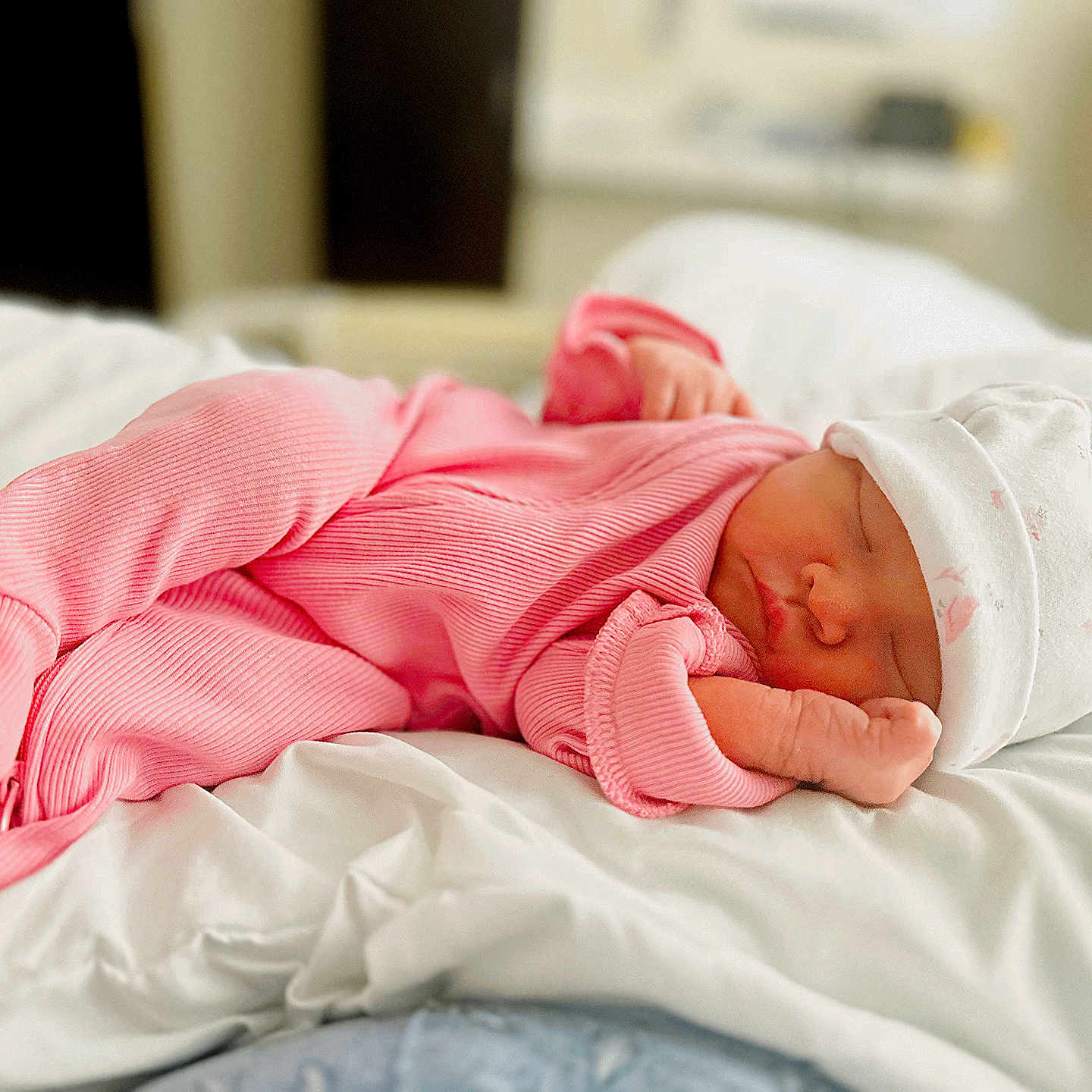 Savannah Cataleya is registered to the contest to win money with this photo: baby, bed, blanket, child, comfort, cozy, cute, hat, indoors, infant, newborn, peaceful, pink_outfit, portrait, resting, sleep, sleeping, soft, toddler, white