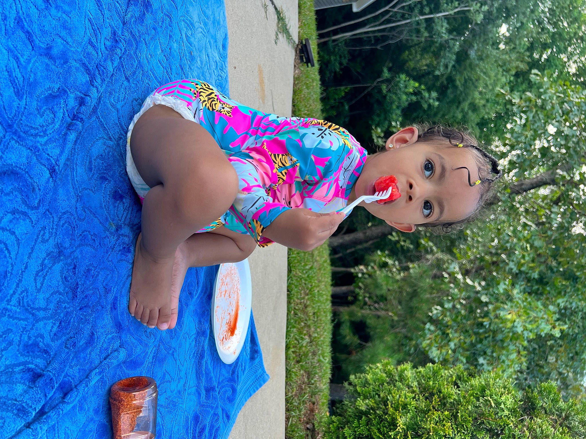 Milah is registered to the contest to win money with this photo: abdomen, blue, chest, child, electric_blue, face, fun, grass, happy, human_leg, knee, leisure, people_in_nature, person, plant, smile, thigh, tree, trunk, waist