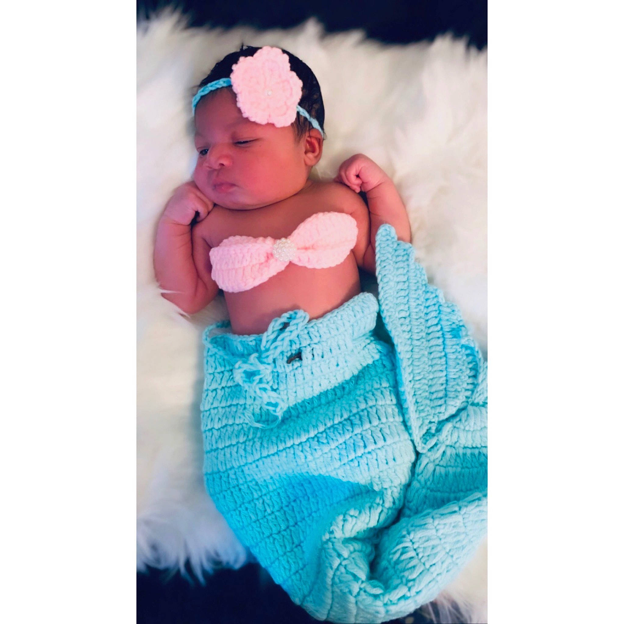 Khalani joined the competition — help win amazing prizes! aqua, baby, baby_toddler_clothing, blue, child, clothing, costume, design, hair_accessory, headgear, headwear, outerwear, pattern, person, pink, product, teal, textile, toddler, turquoise